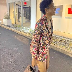 Beautiful tailed floral blazer designed by Something Navy.